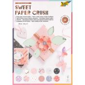 Designpapier mit heißem Folien- und Glitzereffekt. Enthält verschiedene Muster und Farben für Bastelprojekte.