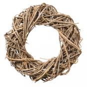 Ein runder Kranz aus dünnen, verwundenen Ästen. Naturmaterial in braunen Farbtönen.