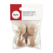 Vier rohe Holzhalbkugeln in einer transparenten Verpackung. Die Kugeln sind unbohrt und haben eine natürliche Holzoberfläche.