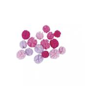 Bunte Stoffblumen in verschiedenen Rosa- und Lilatönen. Runde Formen mit unterschiedlichen Texturen.