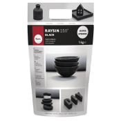 Schwarzes Gießpulver in einer Verpackung. Abgebildete Objekte sind Vasen, Schalen und ein Haus.
