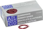 Graue Verpackung mit roten Gummiringen. Auf der Box stehen verschiedene Sprachen für 'Gummiringe'.