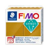 Fimo Modelliermasse in goldener Farbe. Verpackung mit Informationen zur Anwendung.
