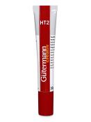 Tube mit Textilkleber von Gütermann. Rote und weiße Verpackung, 30g Inhalt.