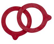 Zwei rote, runde Ringe aus flexiblem Material. Sie haben eine kleine Ausbuchtung an einer Stelle.