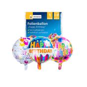 Drei bunte Folienballons mit dem Aufdruck 'Happy Birthday'. Verschiedene Designs und Farben. Verpackung im Hintergrund.