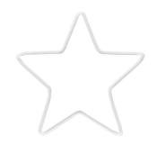 weißer Ausstecher in Form eines Sterns. Einfaches, minimalistisches Design.
