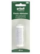 Weißer elastischer Nähfaden auf einer Rolle. Verpackung zeigt die Länge von 20 Metern.
