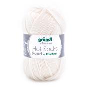 Wollknäuel in hellem Beige. Geeignet für Socken, enthält Kaschmir.