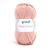 Rosa Baumwollgarn in einem runden Knäuel. Die Verpackung zeigt den Namen 'Baby Cotton' und das Markenlogo.