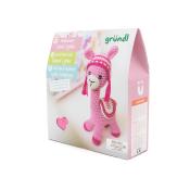 Häkelset für ein pinkes Lama namens Lydla. Verpackung zeigt das fertige Produkt und enthält Anleitungen.