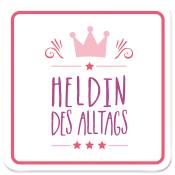 Weißer Hintergrund mit pinkem Rahmen. Text 'Heldin des Alltags' und eine Krone darüber.