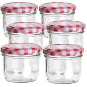 Sechs leere Glasgefäße mit rot-weißem kariertem Deckel. Die Gläser sind rund und haben eine klare Oberfläche.