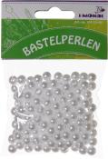 Packung mit Bastelperlen in transparentem Kunststoff. Die Perlen sind rund und glänzend.