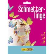 Verpackung mit essbaren Schmetterlingen für Tortendekoration. Bunte, dreidimensionale Schmetterlinge auf rosa Hintergrund.