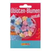 Verpackung mit essbaren Blüten in Pastellfarben. Blütenformen in Gelb, Blau und Pink.