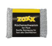 Silberner Küchenschwamm im 2er-Pack. Verpackung mit schwarzem Hintergrund. Hinweis auf sanfte Reinigung für fast alle Oberflächen.