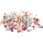 Bunte Papierschnipsel in Blumenform. Verschiedene Farben und Größen.