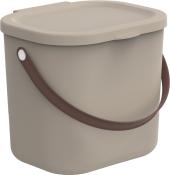 Beige Kunststoffbox mit ovalem Deckel und braunem Henkel. Die Form ist quadratisch mit abgerundeten Ecken.