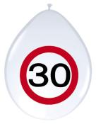 weißer Ballon in Tropfenform. Aufdruck eines Verkehrszeichens mit der Zahl 30 in schwarzer Schrift, umgeben von einem roten Kreis.