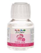 Flasche mit essbarem Kleber. Transparentes Design mit bunten Cupcakes auf dem Etikett.