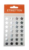 Blatt mit silbernen Sternenaufklebern. Enthält mehrere Sterne in gleichmäßigen Abständen.