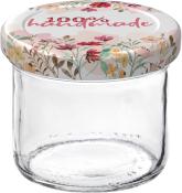 Glasbehälter mit einem bunten, floral bedruckten Deckel. Der Deckel trägt den Schriftzug '100% handmade'.