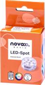 Orangene Verpackung für einen wasserdichten LED-Spot. Abgebildet ist der Spot mit mehreren LEDs. Hinweis auf Farbwechsel und IP68-Zertifizierung.