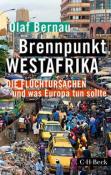 Buchcover mit dem Titel 'Brennpunkt Westafrika'. Bild zeigt eine belebte Stadtlandschaft mit Autos und Menschen.