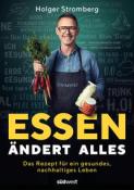 Buchcover mit dem Titel 'Essen ändert alles'. Abgebildet sind ein Mann mit Brille, der Gemüse hält.