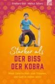 Buchcover mit dem Titel 'Stärker als der Biss der Kobra'. Ein Junge sitzt auf einem Reifen und hält einen Stock.
