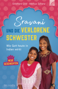 Buchcover mit dem Titel 'Sravan und die verlorene Schwester'. Zwei Mädchen in traditioneller indischer Kleidung, fröhliche Ausstrahlung.