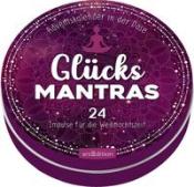 Runde Dose mit dem Titel 'Glücks Mantras'. Lila Farbton mit dekorativen Mustern.