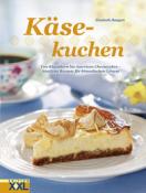 Buchcover mit dem Titel 'Käsekuchen'. Abgebildet ist ein Käsekuchen auf einem Teller, umgeben von einer Tasse und Dekoration.