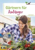 Buchcover mit dem Titel 'Gärtnern für Anfänger'. Eine Frau pflanzt Blumen in einen Topf.