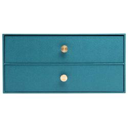 Tealfarbige Aufbewahrungsbox mit zwei Schubladen. Goldene Knöpfe zum Öffnen der Schubladen.