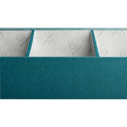 Tealfarbene Aufbewahrungsbox mit drei Fächern. Innen mit grauem Muster.