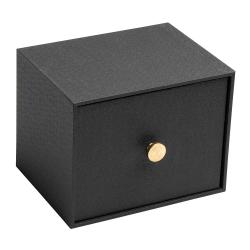 schwarze Aufbewahrungsbox mit goldener Knopföffnung. Quadratische Form, matte Oberfläche.