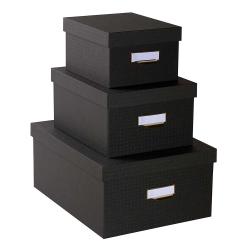 Drei schwarze Aufbewahrungsboxen in verschiedenen Größen. Jede Box hat einen goldenen Griff und ein beschriftbares Etikett.