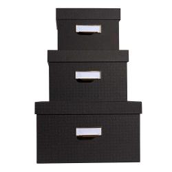 Drei schwarze Aufbewahrungsboxen in verschiedenen Größen. Jede Box hat einen goldenen Griff und ein beschriftbares Etikett.