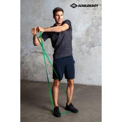 grüne Widerstandsbänder, flach und elastisch. Beschriftung mit 'Super Band Light', Gewicht 12-20 kg.