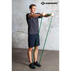 grüne Widerstandsbänder, flach und elastisch. Beschriftung mit 'Super Band Light', Gewicht 12-20 kg.