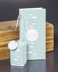 Verpackung für einen Bastelstanzer mit Fischmotiv. Enthält eine Abbildung von Fischen und Punkten.