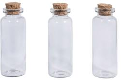 Drei transparente Glasflaschen mit Korkverschluss. Flaschen sind gleich groß und zylindrisch.