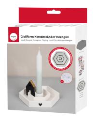 Siliconform für einen hexagonalen Kerzenständer. Farbe: Weiß. Enthält eine schwarze Holzfigur in Form eines Hauses. Kerze in der Mitte. Herzmotiv auf der Basis.