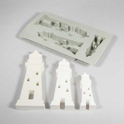 Silikonform mit drei Leuchtturm-Designs. Die Form ist grau und hat verschiedene Details.