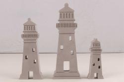 Silikonform mit drei Leuchtturm-Designs. Die Form ist grau und hat verschiedene Details.