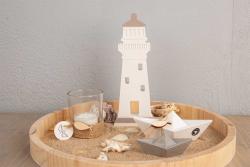 Silikonform mit drei Leuchtturm-Designs. Die Form ist grau und hat verschiedene Details.