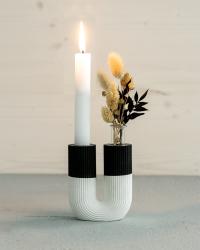 Schwarze U-förmige Vase mit goldenen Akzenten. Zwei Glasröhren für Blumen sind enthalten.