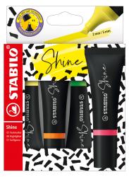 Set von Stabilo Shine Textmarkern. Vier Marker in verschiedenen Farben: Gelb, Grün, Orange, Pink. Verpackung mit buntem, grafischem Muster.